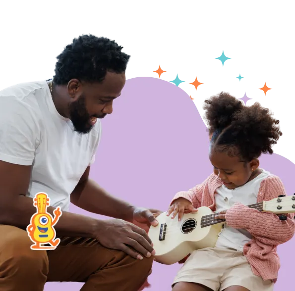 une enfant est accompagnée de son père pour apprendre à jouer du ukulélé